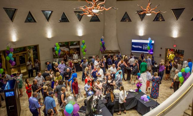 River Hippo Camp round room at Memphis Zoo filled with people during Zoo Rendezvous